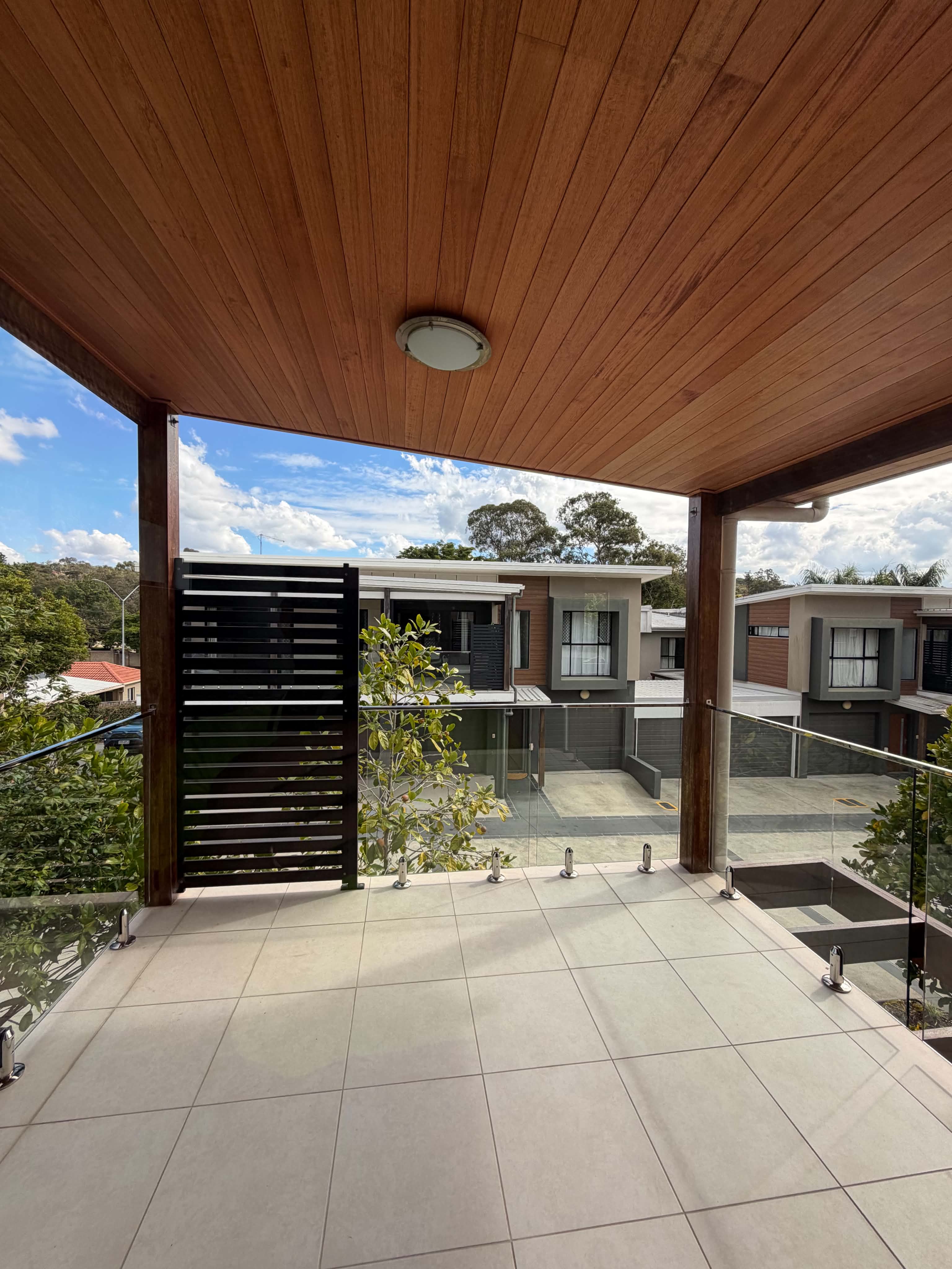 Warm timber soffit feature finish